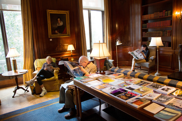 Library members reading periodicals in the Members' Room.